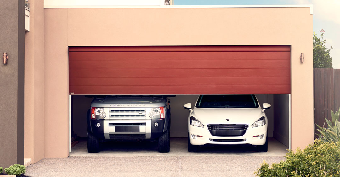 Drive straight in or reverse - the automatic garage roller door from Darwin Doors And Gates will keep you dry